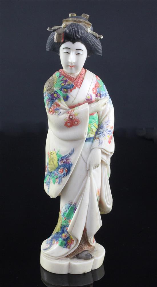 A Japanese coloured ivory figure of a bijin, early 20th century, 21cm